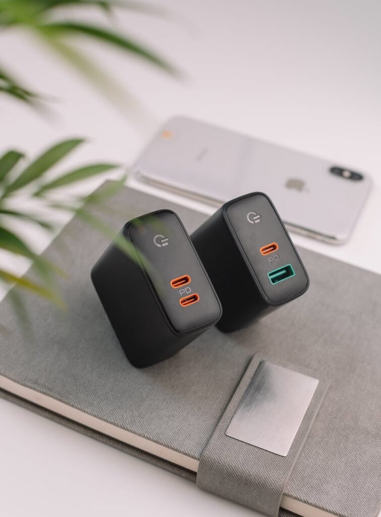 power banks on notebook on white table